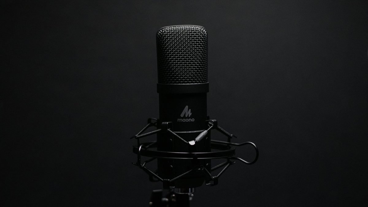 A microphone against a dark background