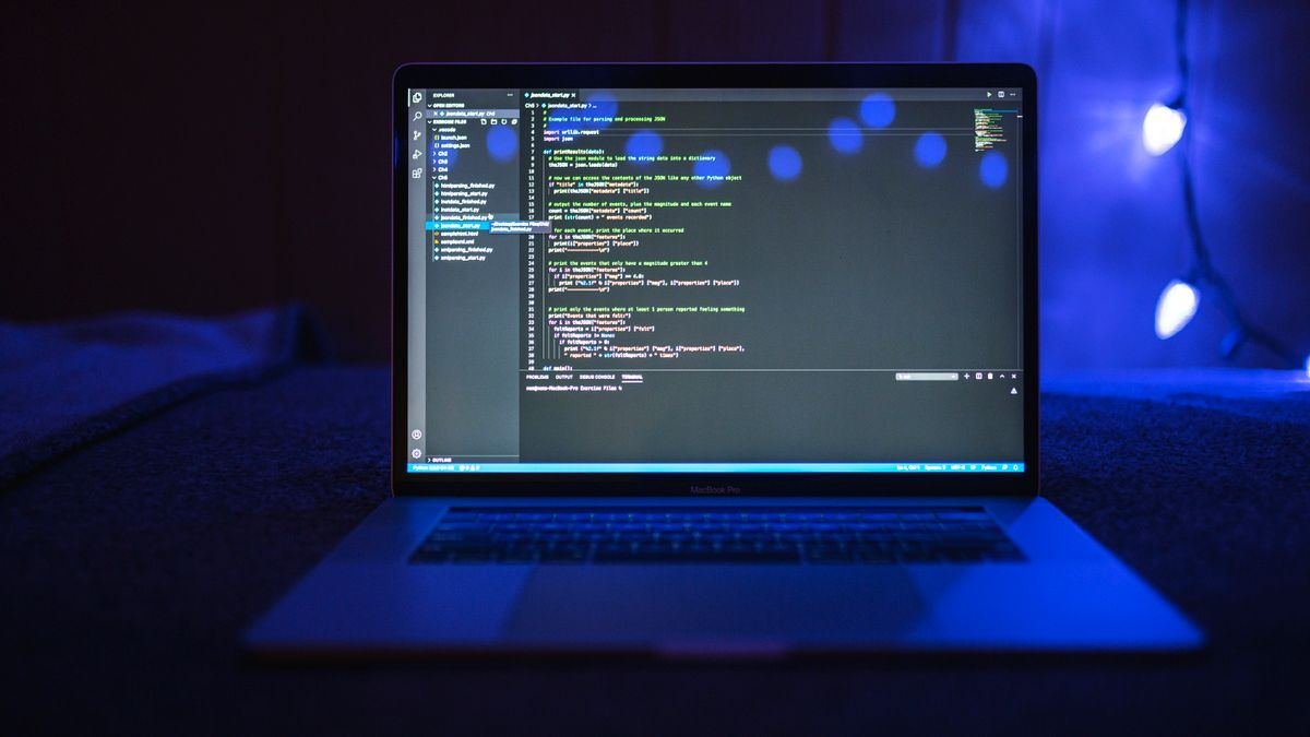 Developer working on website code late at night
